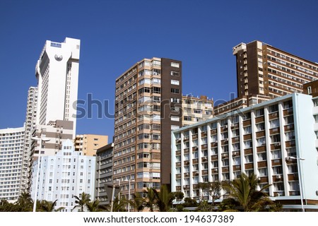 DURBAN, SOUTH AFRICA - MAY 24, 2014: Commercial and residential buildings against blue sky on Golden Mile beachfront in Durban South Africa