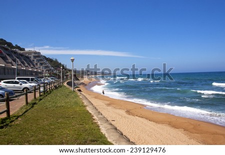 DURBAN, SOUTH AFRICA - DECEMBER 18, 2014: Many unknown people at Umdloti Beach In Durban, South Africa