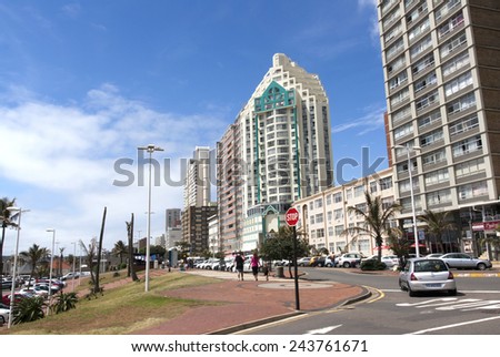 DURBAN, SOUTH AFRICA - DECEMBER 28, 2014: Many unknown people and residential and commercial buildings on Durbans \