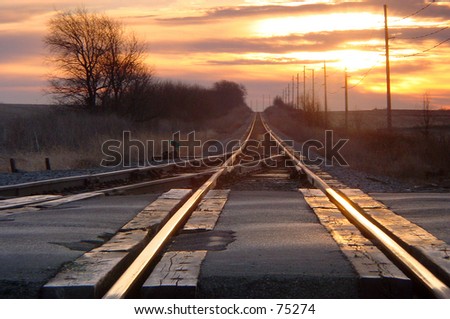 Lonely railroad crossing on cold winter morning