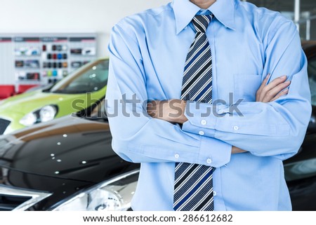 Employees Standing in front of car