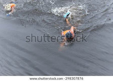 LAMPHUN, THAILAND - JULY 18 : Athletes are swimming in river at Lanna adventure tournament on July 18, 2015 in lamphun, Thailand