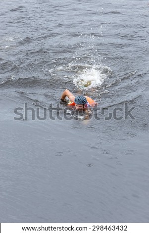 LAMPHUN, THAILAND - JULY 18 : Athlete swimming in river at Lanna adventure tournament on July 18, 2015 in lam phun, Thailand