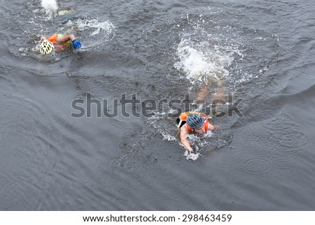 LAMPHUN, THAILAND - JULY 18 : Athletes swimming in river at Lanna adventure tournament on July 18, 2015 in lam phun, Thailand