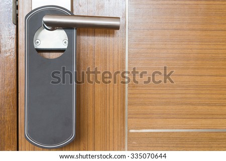 Blank label paper hang on door knob for your text