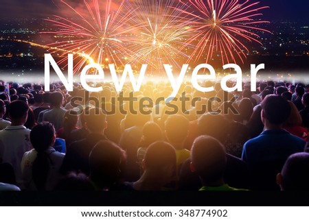 Crowd of people flow in countdown to next year with text New year