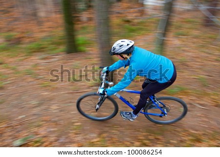 Mountain biking down the trail (intentional motion blur)