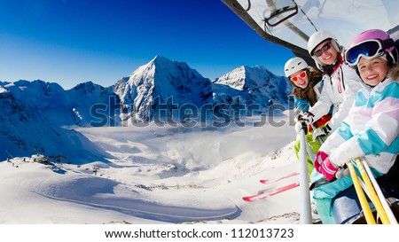 Skiing, ski lift, winter - skiers on ski lift
