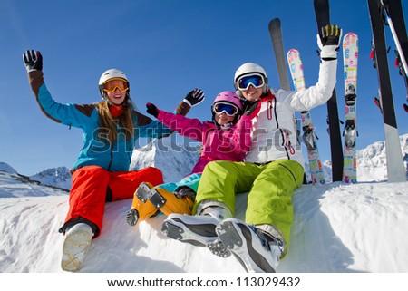Skiing winter holidays happy skiers enjoying winter vacation Skiing winter holidays happy skiers enjoying winter vacation
