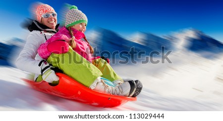 Winter fun - sledding at winter time