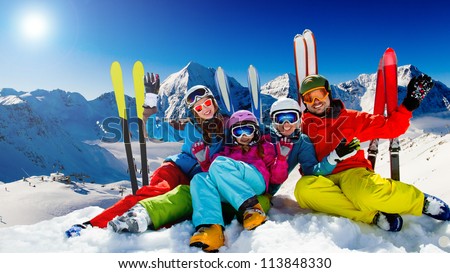 Ski snow sun and winter fun happy family ski team Ski snow sun and winter fun happy family ski team