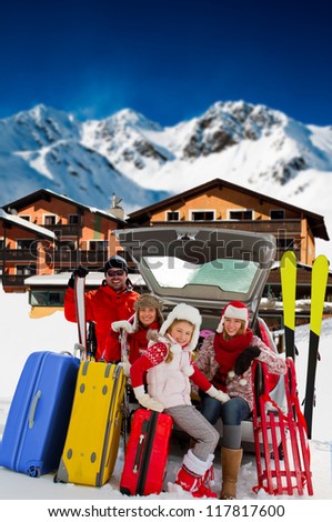 Winter vacations, ski, travel - family with baggage ready for the travel for ski vacations