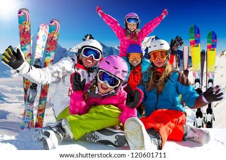 Winter fun, skiing - happy family ski team