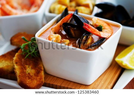 Fish soup - traditional Mediterranean fish soup with mussels and shrimp
