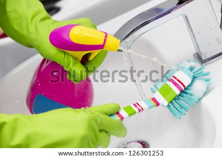 Cleaning - Cleaning Bathroom Sink With Spray Detergent - Housework, Spring Cleaning Concept