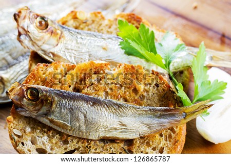 Fish, Spanish  tapas - sprat on baked bread
