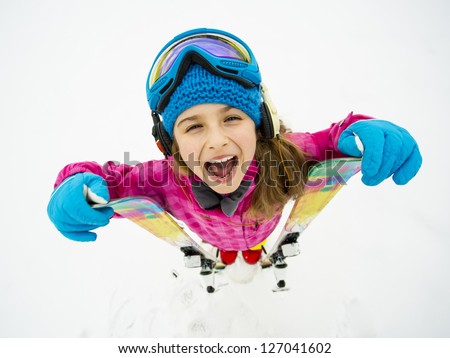 Skiing, winter sports, winter fun - portrait of young skier