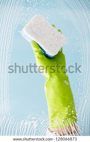 Cleaning - cleaning pane with detergent, spring cleaning concept