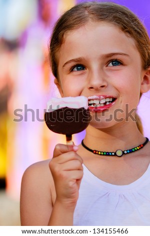 Summer joy  - portrait of  lovely girl with ice cream, happy child concept