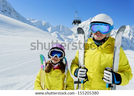 Ski, ski resort, winter sports - family on ski vacation