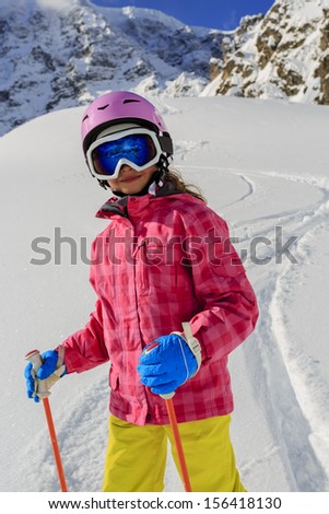Skier, skiing, winter sport - portrait of happy girl skier