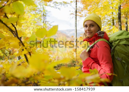 Autumn trek woman on mountain hike Autumn trek woman on mountain hike