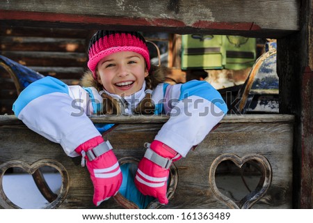 Winter, apres ski - girl enjoying winter vacation