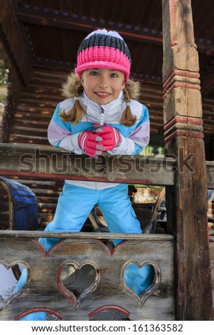 Winter, apres ski - girl enjoying winter vacation