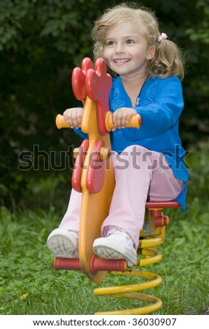 Playing on a teeter totter