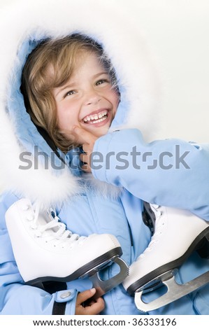 Happy girl with figure skates