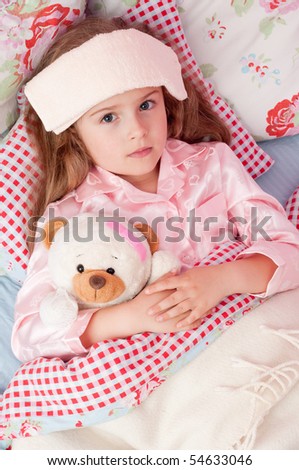 Ill girl with teddy bear in the bed  ( No-name teddy bear )