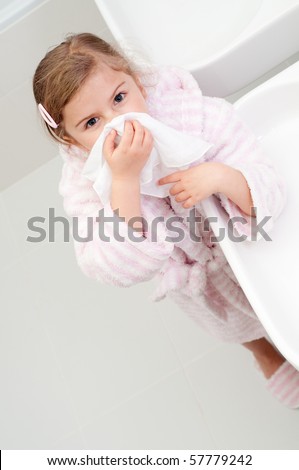 Girl Blowing Nose