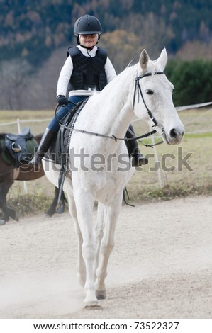 horseback riding quotes. horse riding girl. stock photo