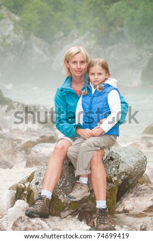 Trekking with mother in misty morning