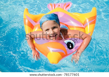 Summer vacation - little girl in blue water (no name toy)
