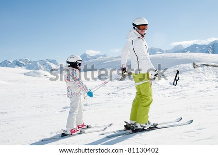Skiing - ski lesson in winter resort