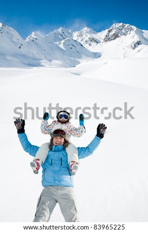 Winter, ski, sun and fun - happy family in winter resort (copy space, cover)