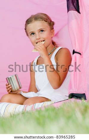 Happy childhood - Camping in tent - girl on camp tent