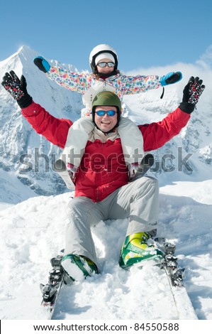 Ski, snow, sun and fun - skiers on winter vacation (cover)