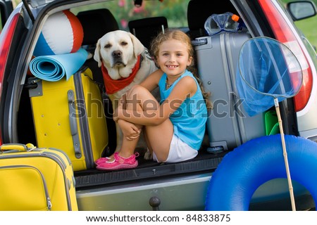 Vacation, Travel - Girl with dog ready for the travel for summer vacation