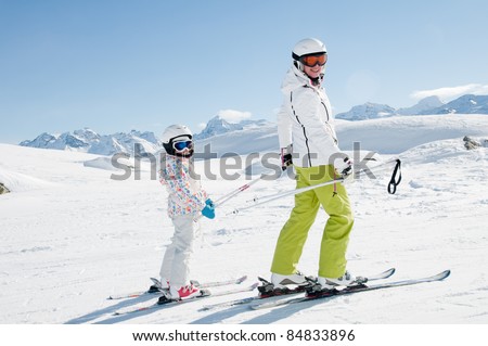 Skiing - ski lesson in winter resort
