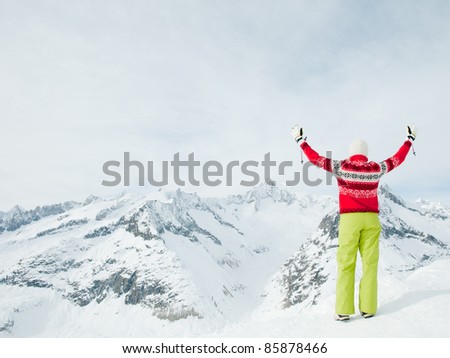 Ski, winter - happy skier in high mountains (space for text)