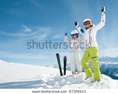 Ski vacation - portrait of happy skiers