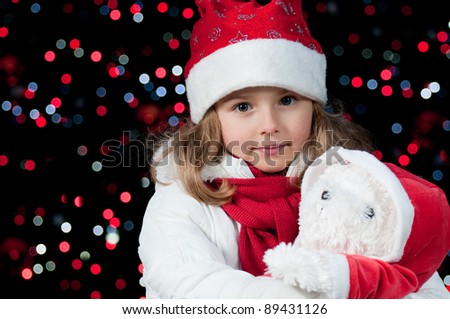 Magic Christmas lights - cute girl at Christmas night (no-name toy)
