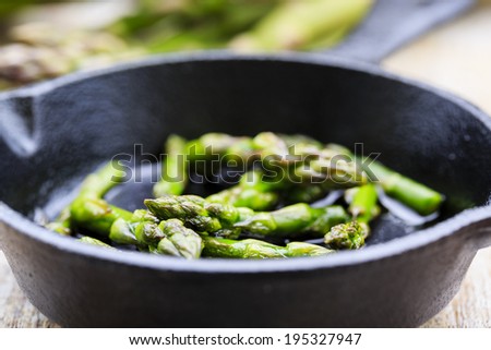 Asparagus on frying pan