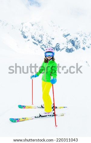 Ski, winter sport - lovely skier girl enjoying ski vacation