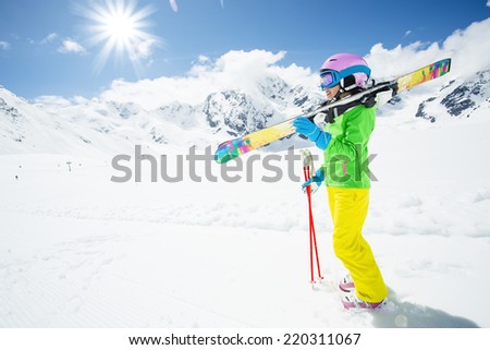 Ski, winter sport - lovely skier girl enjoying ski vacation