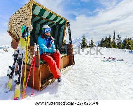 Skiing, winter sport, snow and sun - woman enjoying ski vacation