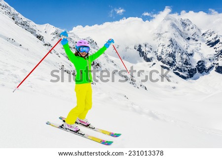 Skiing, winter, ski lesson - young skier on mountainside