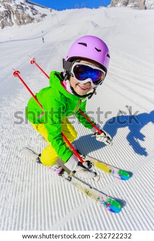 Skiing, winter, ski lesson - young skier on ski run